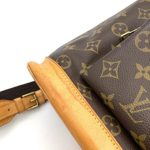 LOUIS VUITTON Brown Monogram Backpack - Picture 13 of 15